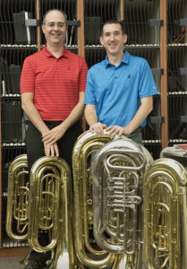 Jim Lesieur, left, directs the middle school band at NW Regional 7, while Steve Zimmerman, who also teaches music history and theory, leads the two high school bands.