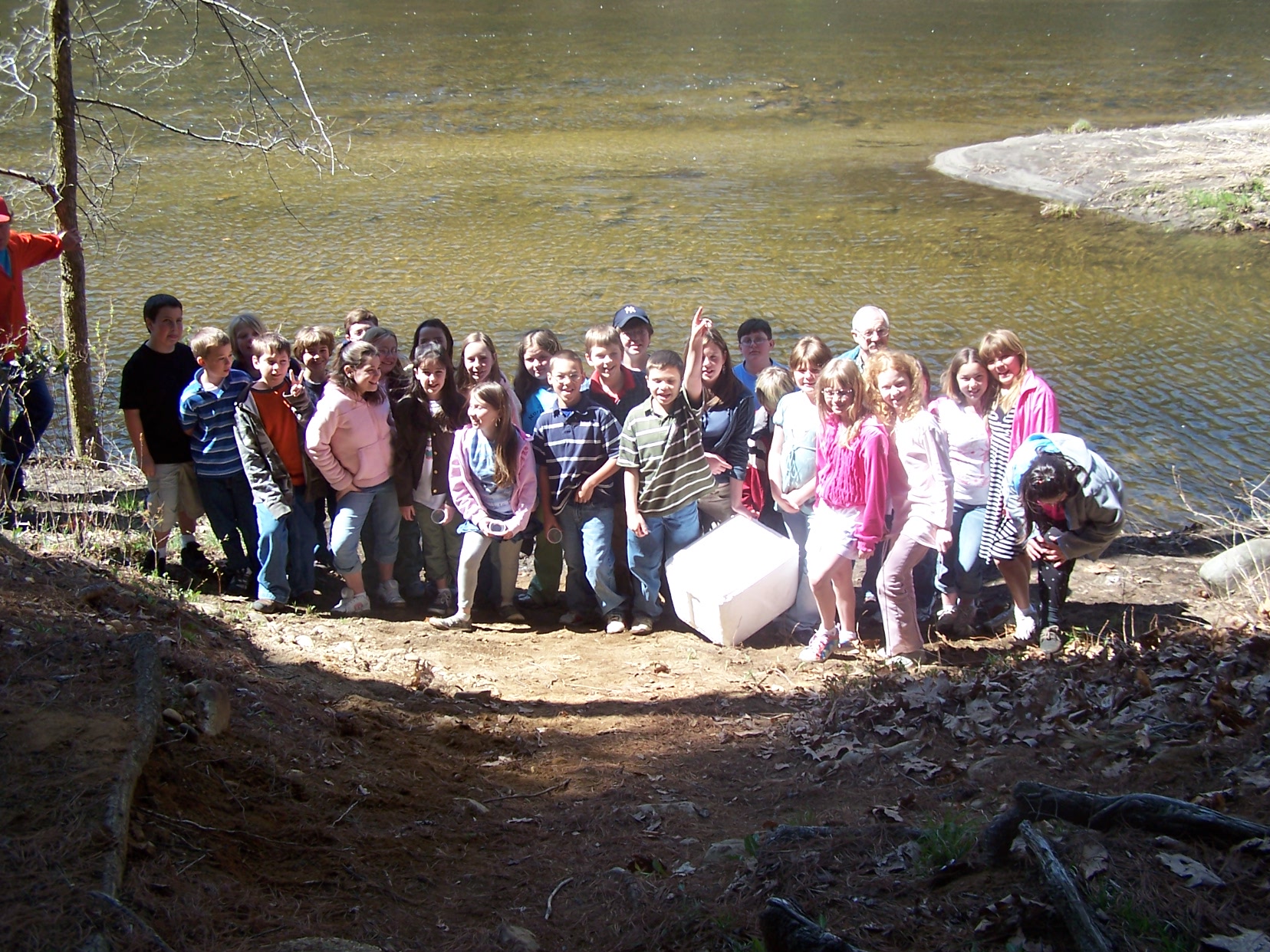 Fifth Grade Releases Salmon Fry in Sandy Brook