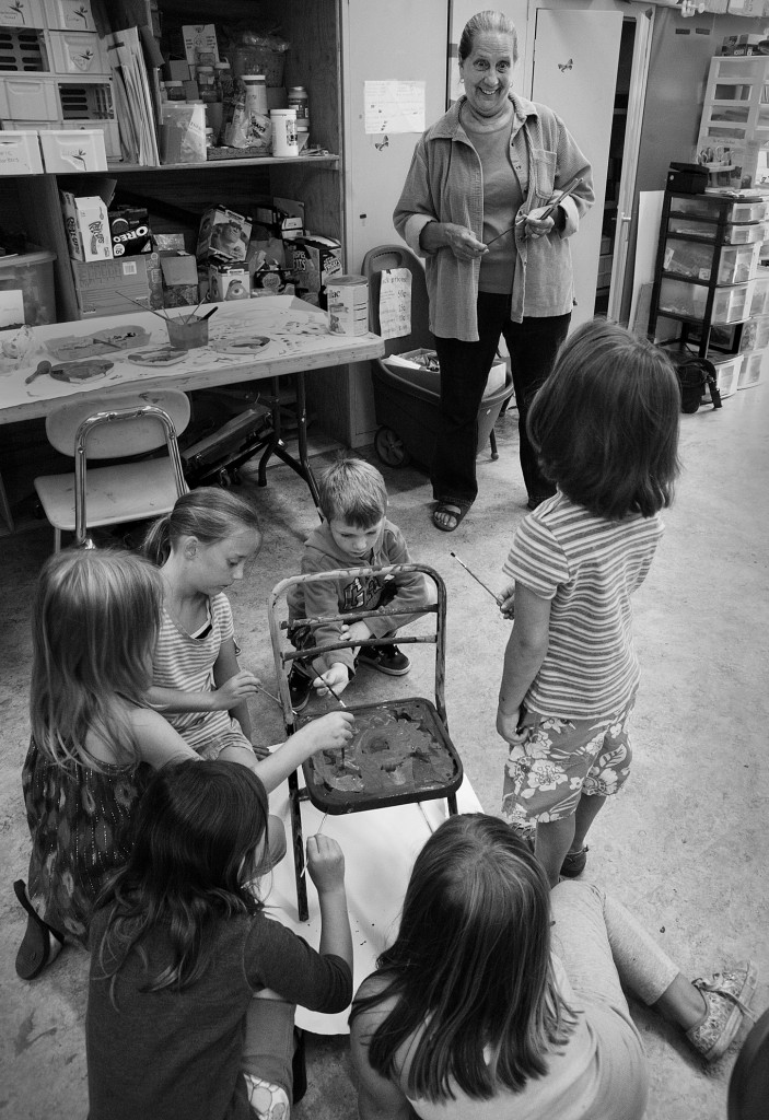 Canaan's Lynn Naia works with budding future furniture designers in the art room at Camp AHA!, Canaan's unique summer program. Photograph by Bruce Frisch