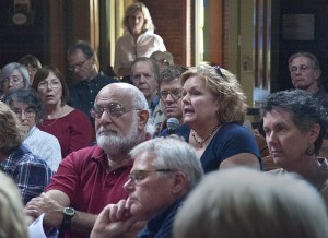 Audience members made statements and asked the panelists questions. Above, Shirley Metcalf has the microphone.