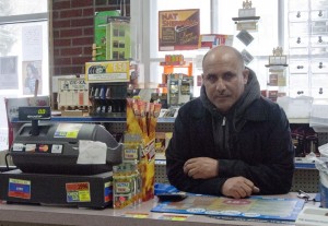 With Fadhl Saleh (top of page), Jamal Al-Kushree runs the Norfolk Corner Store. Photos by Bruce Frisch.