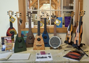 The Webbs produce a variety of instruments, from their trademark ukes to a banjo and the Cricket (right).