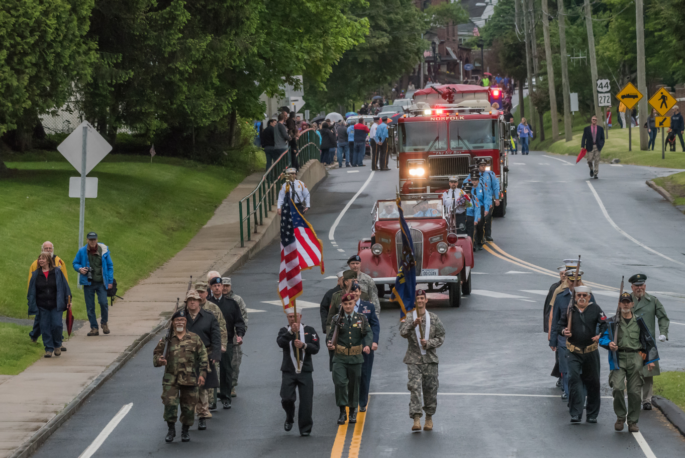 Light Rain Falls on Norfolk Parade but Fails to Dampen Spirits
