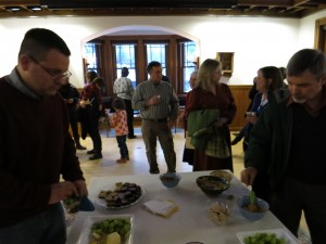 Chris Peterson, center, at the recent opening for his show at the Norfolk Library.